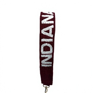 Lanière perlée bordeaux avec texte INDIANA blanc et fermoir mousqueton en métal - Product Image 1