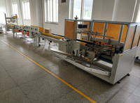 Machine d'emballage de boîtes en carton