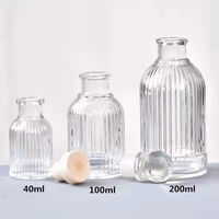 Vente en gros de diffuseurs d'huiles essentielles sans flamme en verre de 50 ml/100 ml/200 ml/500 ml, impression sur écran, décoration en rotin