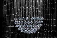 Lustre moderne en cristal double sphère effet goutte de pluie pour escalier long