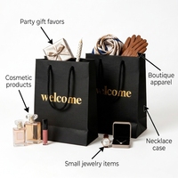 Sacs cadeaux en papier noir premium FB23 avec gaufrage doré « Bienvenue » pour les cadeaux de fête et les cadeaux d'événements
