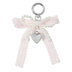 Nueva primavera dulce encaje Bowknot bolsa encanto aleación llaveros y joyería colgante accesorios con perla encaje arco novedad regalos - Product Image 1