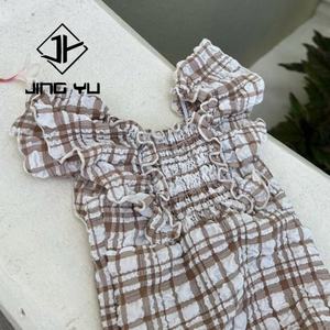 Traje de Baño de Alta Calidad para Bebés con Protección Solar, Mangas con Volantes, Tela Arrugada a Cuadros, Traje de Baño Infantil con Elástico - Product Image 5