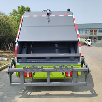 Camion à ordures compacteur SINOTRUCK 4*2 d'une capacité de 6 m³, conçu pour l'Amérique du Sud avec une réduction de 20 %