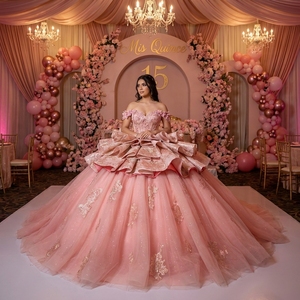 ชุดราตรีงาน Quinceanera รุ่น Dy1565 สีพีชสุดหรู ตกแต่งด้วยลูกไม้ลายดอกไม้สีทองที่ตัวเสื้อ แต่งระบายเป็นชั้นๆ ด้วยผ้าชีฟอง พร้อมชายกระโปรงยาวแบบ Watteau - Product Image 1