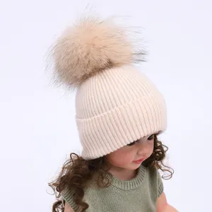 2023 새로운 디자인 도매 겨울 모자 진짜 모피 pom pom 귀여운 고품질 캐시미어 니트 따뜻한 사용자 정의 아기 아이 겨울 비니
