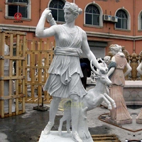 Statue Diana de chasseur en marbre grandeur nature sculptée à la main en pierre naturelle de jardin