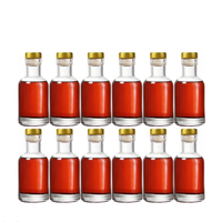 Bouteille ronde vide de 3oz 100ml en verre avec étiquette de logo personnalisé noir transparent pour whisky vodka liqueur vin avec liège