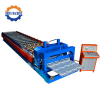 Machine de formage de tuiles en acier coloré pour toiture, machine de fabrication de tôles de toiture en acier coloré