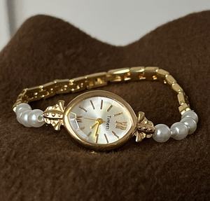 Reloj de Pulsera de Cuarzo para Mujer, Estilo Retro de Alta Gama, con Perlas Doradas, Diseño Minimalista y Lujoso, Superventas - Product Image 1