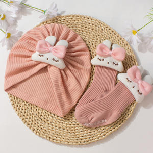 Conjunto de 2 piezas Nuevo conjunto de sombrero de bebé Lindo Color sólido Conejito Medias para niños Sombrero suave Conjunto de calcetines - Product Image 3