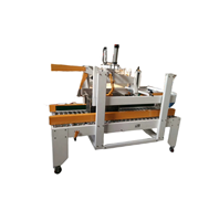 Scellage automatique de carton Fermer Scellant la machine Taping Jus carton lait carton boîte populaire en russie