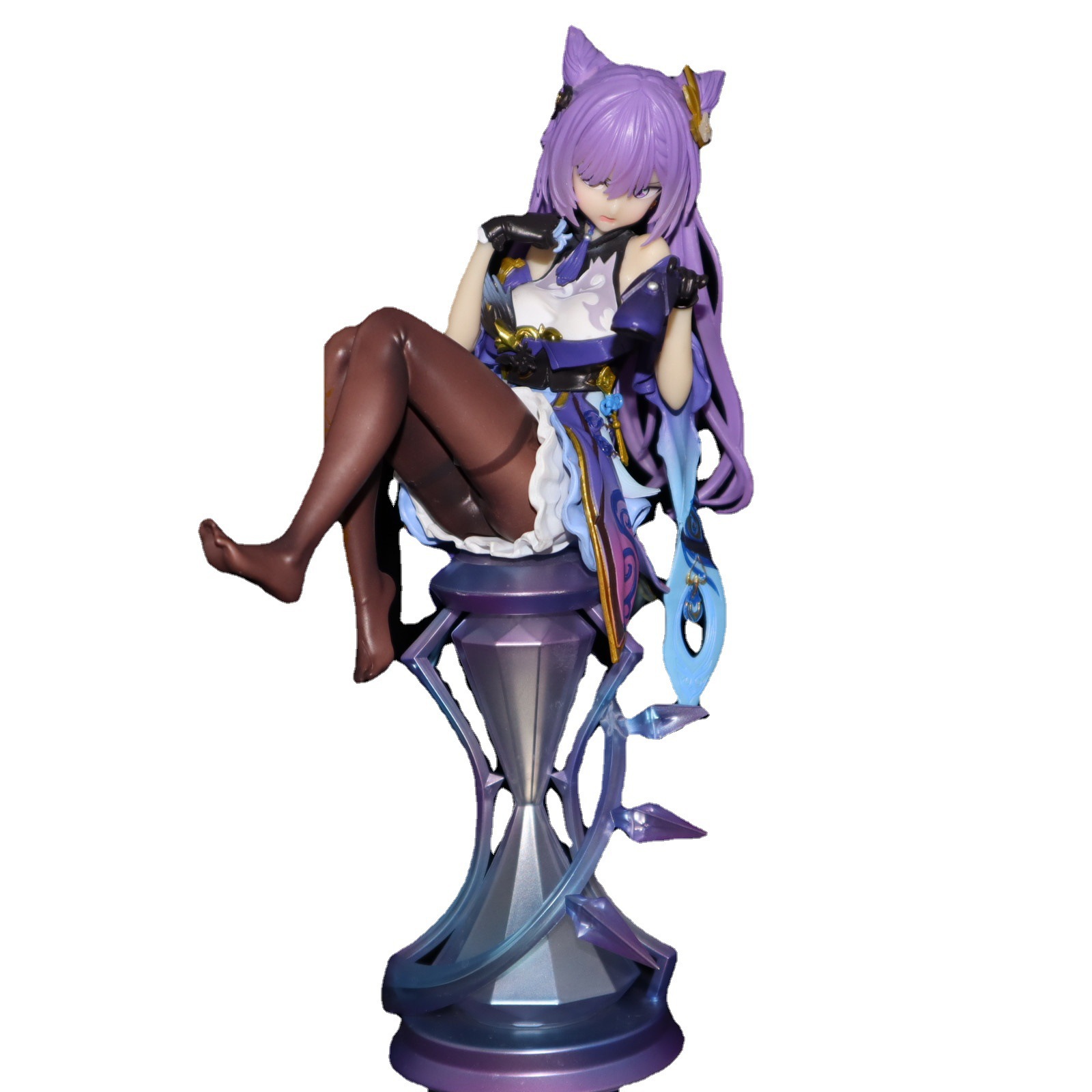 Ke Qing sentado