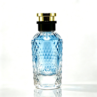 Flacon de parfum de luxe en verre de 100 ml, rond, facetté, à fond épais, flacon pulvérisateur vide, bouchon noir et or, boîte d'emballage personnalisée avec logo