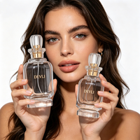 Flacon pulvérisateur en verre cylindrique de luxe 50ml/100ml pour parfum féminin, avec logo personnalisé, compatible diffuseur à bâtonnets, emballage en gros, 100 pièces