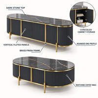 Ensemble de meuble de salon WYRAX Airport Lounge, buffet noir à panneaux cannelés et table basse ovale avec dessus aspect marbre, rangement dissimulé et cadre doré
