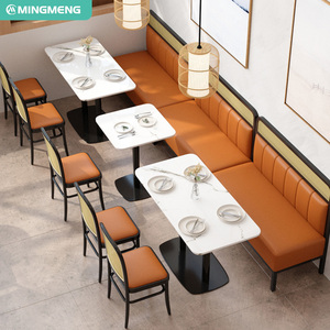 Ensemble de mobilier de restaurant moderne avec banquette en cuir orange et tables en marbre blanc pour salle à manger lumineuse - Product Image 6
