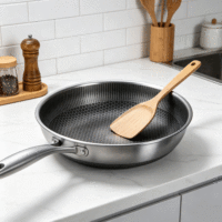 Poêle à frire hybride durable FLEY en acier inoxydable antiadhésif avec intérieur en nid d'abeille fin, pratique, compatible avec diverses plaques de cuisson