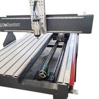 Machine de gravure CNC (avec axe rotatif) pour la gravure 3D sur bois de objets artisanaux et de statues.