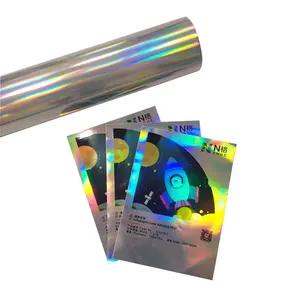 Película superpuesta holográfica, precio al por mayor, rollo de película de laminación en frío autoadhesivo, película de laminación en frío, hoja A4 transparente