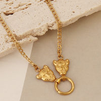 Bracelet à pendentif double tête de léopard en acier inoxydable pour femmes à la mode, bracelet en acier inoxydable français, vente en gros d'usine