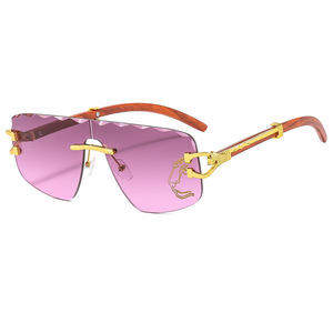 Gafas de Sol QSF sin Marco de una Pieza, UV400, Bordes Ondulados, Tinte Negro, Unisex, con Diadema con Estampado de Leopardo - Product Image 4