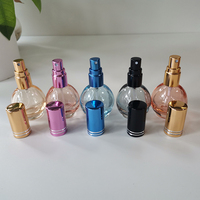 Bouteilles de pulvérisation cosmétiques 10 ml flacon pulvérisateur en verre rond en forme d'ampoule bouteille en verre coloré avec pulvérisateur à brume fine