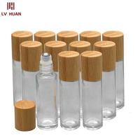 Flacon compte-gouttes en verre Lvhuan pour huiles essentielles, 5 ml, 10 ml, avec couvercle en bois de bambou naturel, flacon roll-on portable, sérigraphié