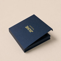 Boîte rigide écologique de luxe personnalisée en forme de livre avec fermeture magnétique et impression flexographique quadricolore pour les truffes au chocolat
