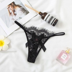Vente directe d'usine de lingerie sexy en dentelle ajourée, tangas transparents très sexy, culottes taille basse à nœud papillon pour femmes. - Product Image 5
