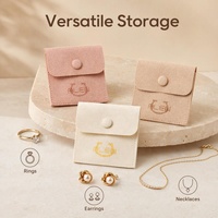 Pochette en microfibre suédée pour bijoux avec bouton-pression, logo personnalisé, petit sac cadeau pour emballage de bijoux, vente en gros