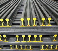 S26 60E1 rel kereta api rel kereta api baja karbon kualitas bagus ASTM R60E 55Q 38kg 43kg 60kg rel kereta api berat dijual