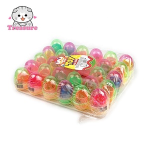 Caramelos al por mayor etiqueta privada personalizada juguete interesante huevo caramelo colorido caramelo duro y bobina de resorte juguete para niños delicioso juguete caramelo - Product Image 3
