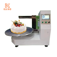 Machine automatique KAINO pour le glaçage, l'étalement, le lissage, la décoration, le recouvrement et le remplissage de gâteaux ronds pour mariages et anniversaires