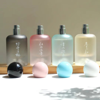 Emballage de parfum personnalisé de luxe, flacon en verre cylindrique vide de 30 ml, 50 ml, 100 ml, vaporisateur de parfum, flacon de parfum rose givré avec boîte