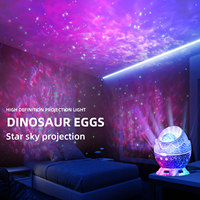 Banqcn 360 Degrés Rotation Planétarium Dinosaure Oeuf Étoilé Projecteur Lampe LED Veilleuse avec Télécommande USB Plug-in