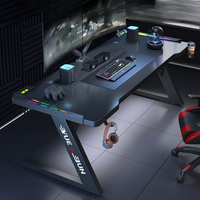 Bureau de jeu RGB noir avec éclairage LED et support pour casque, poste de travail informatique ergonomique pour les joueurs
