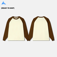 Sweat-shirt à manches raglan longues en coton 100% 250 g/m², col rond, poignets croisés, impression numérique en relief, sérigraphie