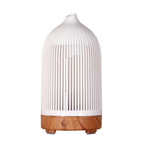 Diffuseur d'arômes sept couleurs, humidificateur ultrasonique mini de bureau, grain de bois, lumière LED, utilisation à domicile et en chambre, capacité de 0,5 L - Product Image 1