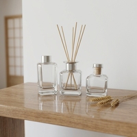 Vente en gros de flacons de parfum en verre transparent de qualité supérieure, 100 ml et 150 ml, à paroi épaisse, carrés, vides, avec bouchons métalliques, pour diffuseur d'arômes.