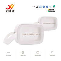 Pochette cosmétique blanche XingHe avec logo personnalisé, panneau givré, fermeture éclair et boucle de poignet pour usage quotidien