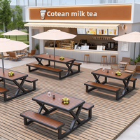 Ensemble table et chaises en plastique imitation bois en forme de X, pliable, mobile, design minimaliste moderne pour cafés commerciaux et cours.