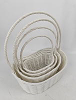 Panier en rotin PE fabriqué en usine avec panier en fer à poignée, panier cadeau en forme de bateau pour le rangement et panier de vacances, lot de 4
