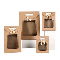 Sac cadeau en papier kraft estampé à chaud avec fenêtre transparente, décoration nœud, sac fourre-tout de qualité supérieure pour emballage cadeau, vente en gros disponible