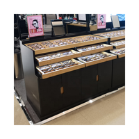Vitrine en bois robuste et étanche avec éclairage LED personnalisé pour la vente au détail de lunettes de soleil, bijoux, téléphones, optiques, mobilier de magasin
