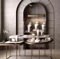 Luxuriöses Bogenförmiges Schmuckgeschäft-Innendesign Schlüsselfertiges Einrichtungspaket Bronze-Gold Vitrinenschränke LED-Beleuchtung Langlebig Einfach zu Montieren