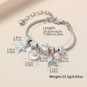 Pulsera de dijes con cuentas estilo marino, con colgantes esmaltados de estrella de mar, cola de sirena y delfín, ajustable, joyería DIY para mujeres y niñas - Product Image 3
