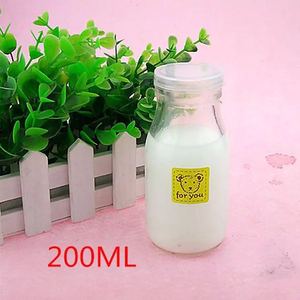 Fabriqué <span class=keywords><strong>En</strong></span> Chine élégant cadeau culture de noix de coco <span class=keywords><strong>en</strong></span> forme de bouteille <span class=keywords><strong>en</strong></span> verre de lait avec bouchon <span class=keywords><strong>en</strong></span> liège <span class=keywords><strong>en</strong></span> verre rond - Product Image 4
