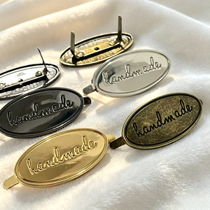 Custom Private Brand Metal <b>Name</b> <b>Labels</b> Own Logo Sew-on Metal Tags Customized Metal Emblems for Fashion Brand Apparel - Product Image 3