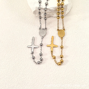 Collar con Colgante de Cruz de Acero de Titanio Dorado al por Mayor, <span class=keywords><strong>Cadena</strong></span> de Cuentas de Acero de Titanio, Joyería de Moda para Clavícula - Product Image 1